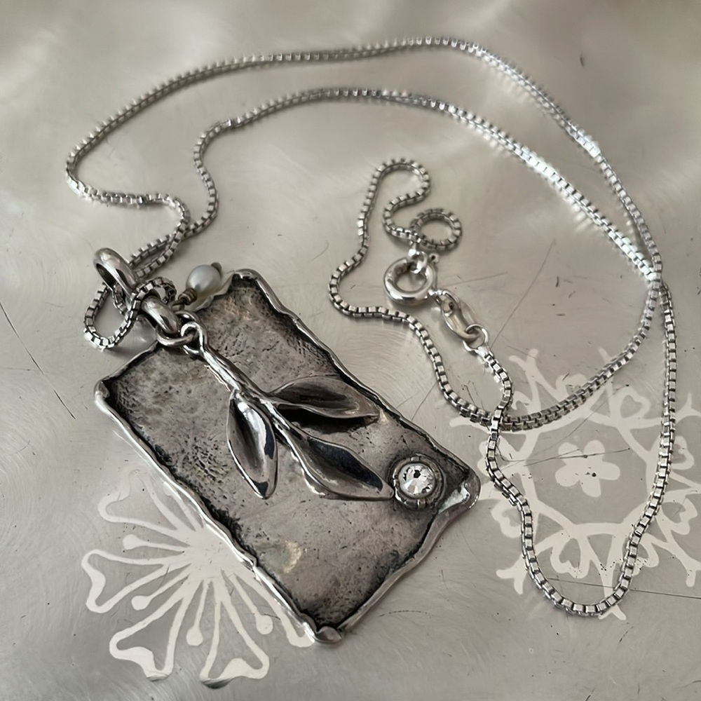 Silpada Sterling pendant with leaf design, pearl, and rhinestone detail